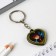A keychain for keys with a place under the photo "Anime", 8 x 3 cm
