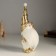 Suvenir Polystone "Santa Claus in a gold cap, with a Christmas tree" 11x9x25 cm