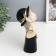 Souvenir Polystone "Girl in a black dress and hat, with beads" 23x9.5x18.5 cm