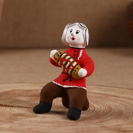 Souvenir boy with harmonies ", Kargopol toy, mix-6