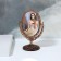 The mirror is desktop, bilateral, with an increase, mirror surface 8.5 × 12.1 cm, bronze color