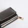 Women's wallet on the button, gray color