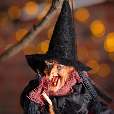 Baba Yaga in satin clothes, hanging, musical-1