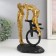 Polystone souvenir "Kiss, pair, monocycle and balloon" Gold 26x17x11 cm