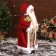 Santa Claus "in a cap, a gift and berries" 46 cm, red