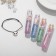 Set 2 objects: bracelet, lip gloss "unicorn" panda, black and white color, 6 cm