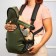The backpack kangaroo "Sitting and lying", the color is green
