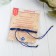 Bracelet-reinforcing "Children's" eye in weaving, blue color in black silver, D = 4 cm