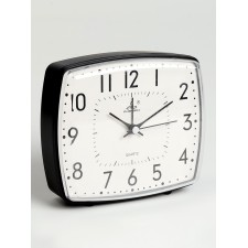 The clock is a boil room, on batteries, 14 x 12.8 x 4.5 cm, dial 13.5 x 11.6 cm