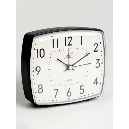 The clock is a boil room, on batteries, 14 x 12.8 x 4.5 cm, dial 13.5 x 11.6 cm