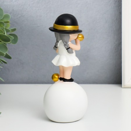 Polystone souvenir "Baby in a black hat, with a gold bubble on the ball" 15x7x7 cm-2