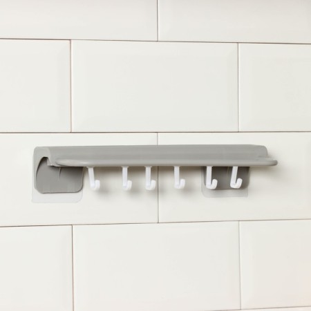Holder for kitchen accessories with a holder for towels-6