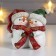 Polystone souvenir "Snowmen in a red cap and a green hat - hugs" 8x5.5x9 cm