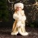 Snow Maiden "In a clutch with fur bombs" 33 cm, golden-white