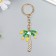 Metal keychain, enamel "Palma with coconuts" 11.4x4.2 cm