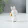 Souvenir Polystone "Easter rabbit Little white with a gold egg" 4.5x3x8 cm