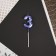 Candle for the cake, the number "3", blue.