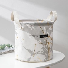 Storage basket with handles of the shade 