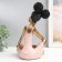 Polystone souvenir "Girl with curly tails, with a dish" pink-gold 17x12x27 cm