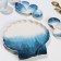 Ceramic “sea shell” saucer, 8.5 x 15 cm., White-blue color