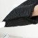 The coupling on the handle of the stroller, quilted, black color