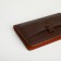 Male purse-clate on a zipper, brown color