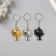 Metal key "Globe" mix 4x3x0.8 cm