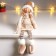 Interior doll "Baby with ponytails in a beige outfit" 62 cm