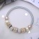 Bracelet Pearl "Margeri" owl, white color in silver, d = 6.5 cm