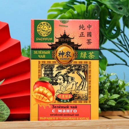 Green large -leaf tea Shennun with mangoes, 100 g-1