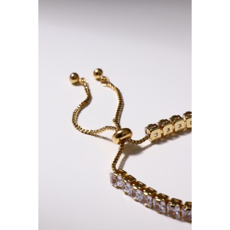 Bracelet with rhinestones "shine" on a puff, the color is white in gold-2