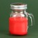New Year's candle in a jar with a handle of "spice", cinnamon