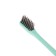 The toothbrush is soft, in the tube, blue