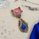Brooch ethnic "Rainbow cat", colored in black gold
