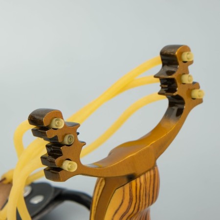 A slingshot with a plastic handle, with an emphasis-3