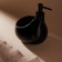A soap dispenser with a Savanna drop sponge stand, 450 ml, black color