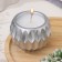 Candle "Shar" in a candlestick with sharp faces of gypsum, 7x6cm, silver