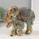 Souvenir Polystone "Elephant with an elephant, chamomile on the ass" red-blue, sparkle 17x10x15 cm 10325