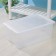 Storage container with Porter lid, 50 l, 66 × 42 × 26 cm, the color is transparent