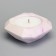 The candle "Square" in the candlestick with beveled corners is small, 9x3.5cm, marble with purple. stripes