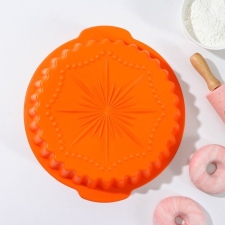 The form for baking is the “corrugated circle. Star ", silicone, 29 × 28 cm, with handles, color mix