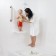 Hinged seat in a bath, white color
