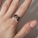 Ring "spell", black color in silver, dimensionless