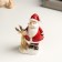 Souvenir Polystone "Grandfather Frost in red caftan and moos" 4x7x11 cm