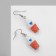 Earrings Assorted "Yummy" seal in a glass, white-orange color in silver