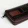 Male purse-clate on the zipper Textura, brown color
