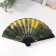 Fan plastic, textile h = 26.5 cm "Green Garden on the Yellow Background"