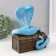 New Year's piggy bank "Cobra on the chest" 20 x 17 x 12 cm.