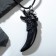 Unisex pendant "Dragon Fang", black color on a black lace, 45 cm