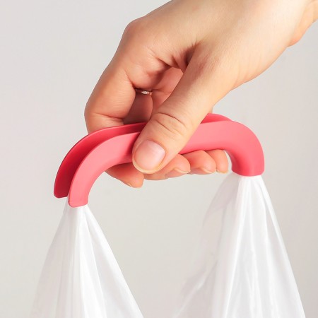 Hand-holder for carrying packages, color mix